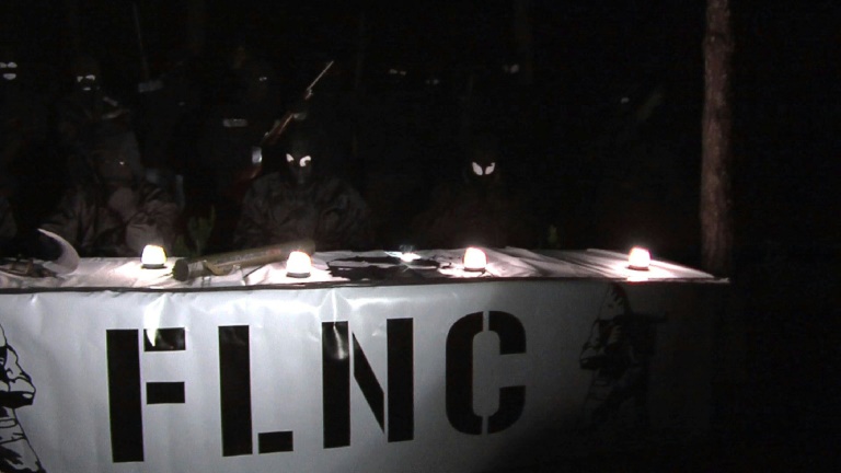 Capture d'écran d'une video de membres du "FLNC du 22 octobre" lors d'une conférence de presse nocturne dans un lieu non identifié le 2 mai 2016. © AFP